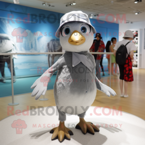 Silver Pigeon mascot costume character dressed with a One-Piece Swimsuit and Caps