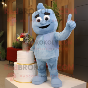Sky Blue Wedding Cake mascot costume character dressed with a Chambray Shirt and Mittens