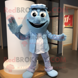 Sky Blue Wedding Cake mascot costume character dressed with a Chambray Shirt and Mittens