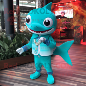 Turquoise Shark mascot costume character dressed with a Blouse and Digital watches