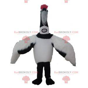 Grote zwart-witte vogel mascotte trekvogel - Redbrokoly.com