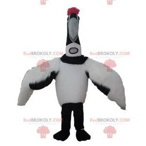 Large black and white bird mascot migratory bird -