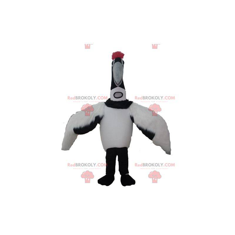 Duży czarno-biały ptak maskotka ptak wędrowny - Redbrokoly.com