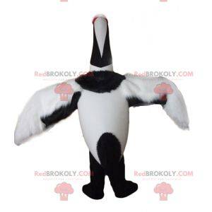 Large black and white bird mascot migratory bird -
