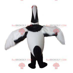 Large black and white bird mascot migratory bird -