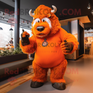 Orange Bison mascot costume character dressed with a Jumpsuit and Mittens