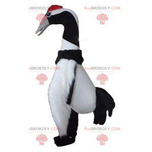 Large black and white bird mascot migratory bird -