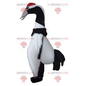 Mascotte de grand oiseau noir et blanc d'oiseau migrateur -