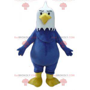 Mascota águila gigante y regordeta azul, blanca y amarilla -