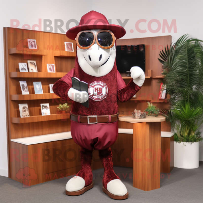 Maroon Horseshoe mascot costume character dressed with a Romper and Reading glasses Maroon Horseshoe mascot costume character dressed with a Romper and Reading glasses