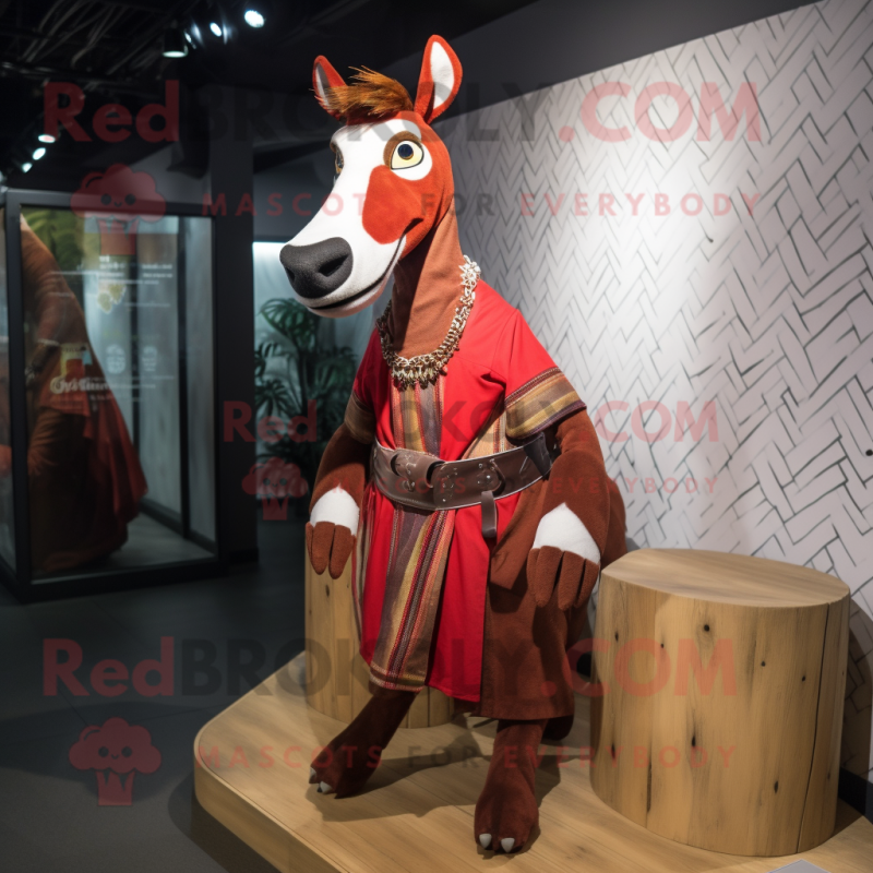 Red Okapi mascot costume character dressed with a Waistcoat and Wraps