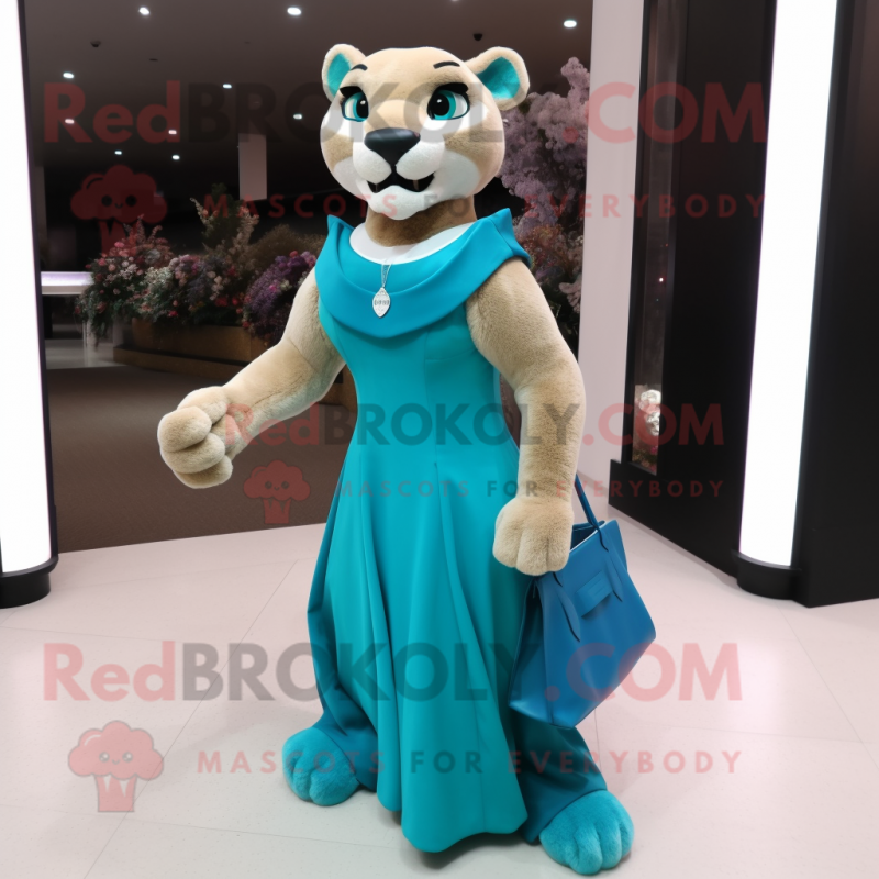 Cyan Mountain Lion mascot costume character dressed with a Evening Gown and Handbags Cyan Mountain Lion mascot costume character dressed with a Evening Gown and Handbags