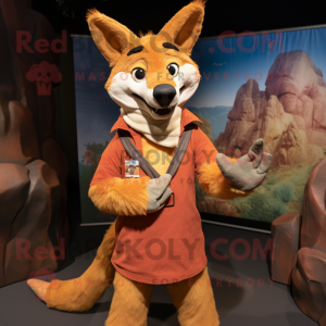 Rust Dingo mascot costume character dressed with a Sheath Dress and Mittens