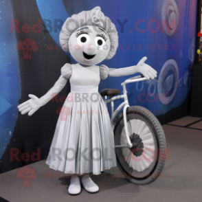 Silver Unicyclist mascot costume character dressed with a Empire Waist Dress and Handbags