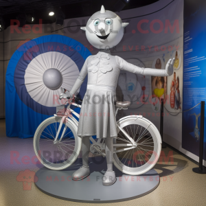 Silver Unicyclist mascot costume character dressed with a Empire Waist Dress and Handbags