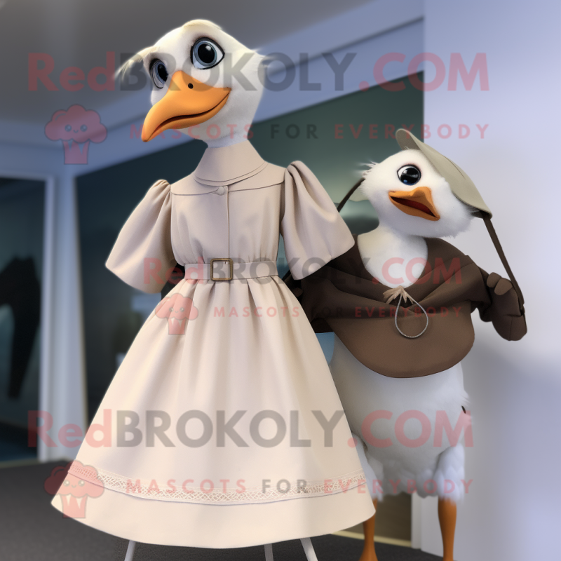 Tan Seagull mascot costume character dressed with a A-Line Dress and Cummerbunds Tan Seagull mascot costume character dressed with a A-Line Dress and Cummerbunds