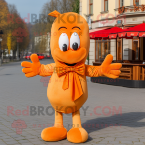 Orange Currywurst mascot costume character dressed with a Sweater and Bow ties