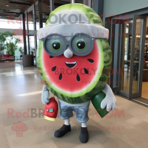 Silver Watermelon mascot costume character dressed with a Chambray Shirt and Reading glasses
