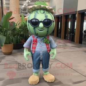 Silver Watermelon mascot costume character dressed with a Chambray Shirt and Reading glasses