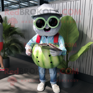 Silver Watermelon mascot costume character dressed with a Chambray Shirt and Reading glasses