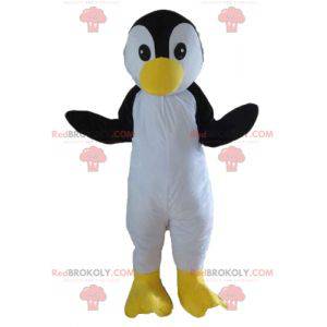 Mascota de pingüino negro pájaro blanco y amarillo -