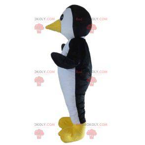 Mascota de pingüino negro pájaro blanco y amarillo -