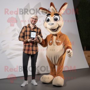Beige Gazelle mascot costume character dressed with a Flannel Shirt and Smartwatches