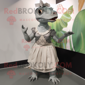 Silver Iguanodon mascot costume character dressed with a Mini Dress and Bow ties