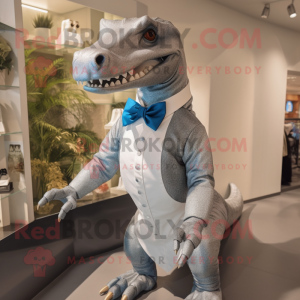 Silver Iguanodon mascot costume character dressed with a Mini Dress and Bow ties