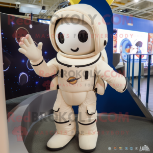 Cream Astronaut mascot costume character dressed with a Flare Jeans and Backpacks