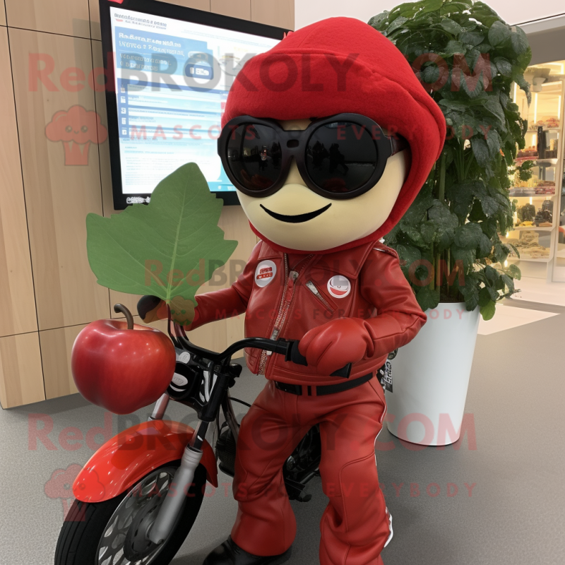 Red Apple mascot costume character dressed with a Moto Jacket and Reading glasses Red Apple mascot costume character dressed with a Moto Jacket and Reading glasses