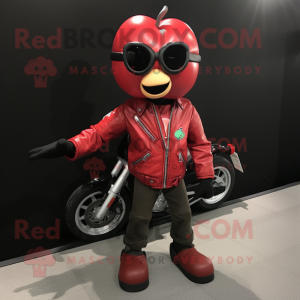 Red Apple mascot costume character dressed with a Moto Jacket and Reading glasses