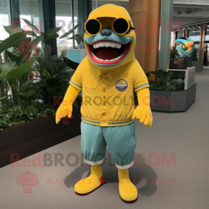 Yellow Megalodon mascot costume character dressed with a Bermuda Shorts and Eyeglasses