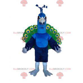 Mascota pavo real gigante azul verde y amarillo - Redbrokoly.com