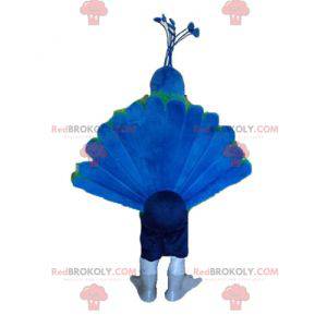 Mascote pavão gigante azul verde e amarelo - Redbrokoly.com