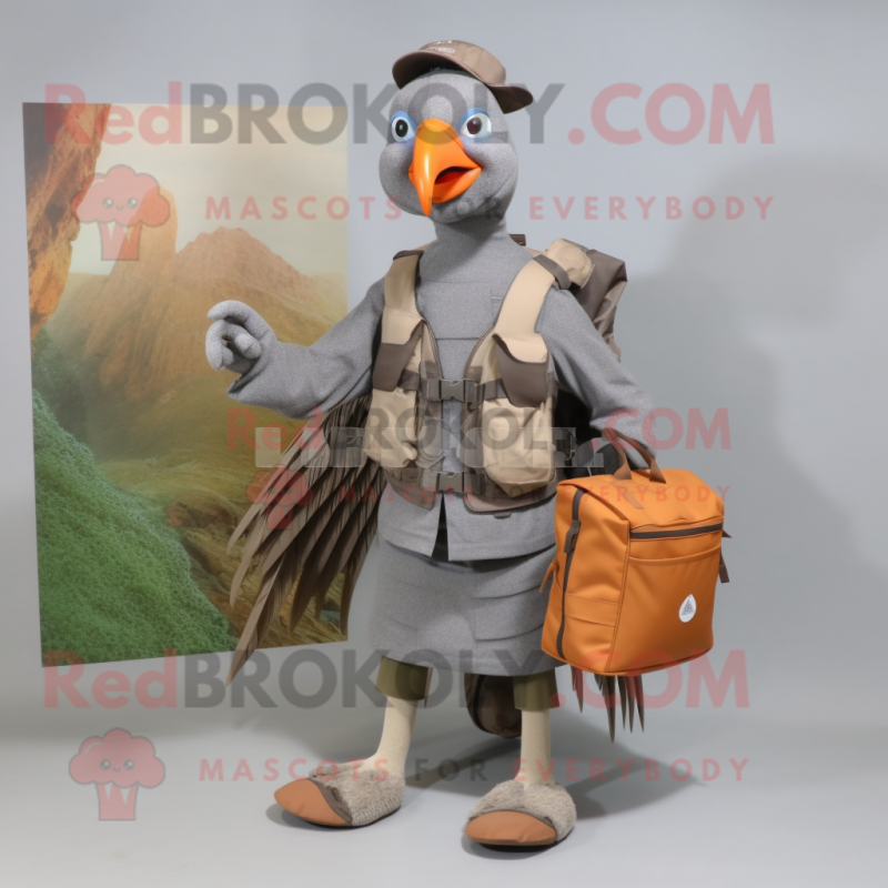 Gray Pheasant mascot costume character dressed with a Cargo Shorts and Messenger bags