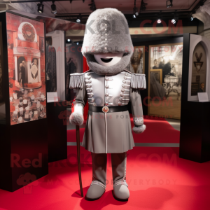 Silver British Royal Guard mascot costume character dressed with a Graphic Tee and Shoe clips