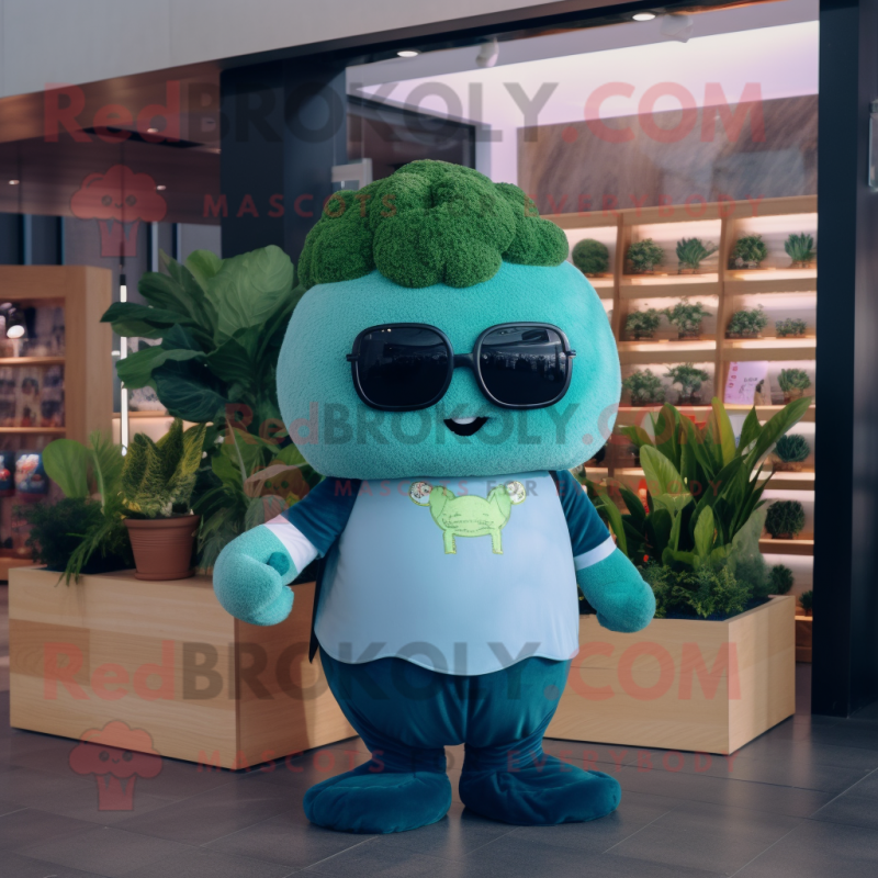 Teal Broccoli mascot costume character dressed with a Culottes and Sunglasses