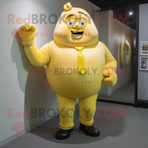 Yellow Strongman mascot costume character dressed with a Blouse and Tie pins