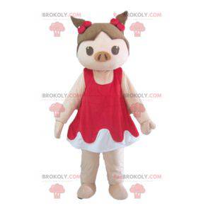 Mascota de cerdo rosa y marrón en vestido rojo y blanco -