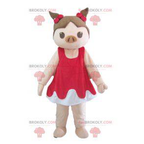 Mascotte de cochon rose et marron en robe rouge et blanche -