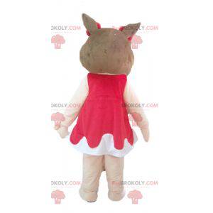 Mascote porco rosa e marrom em vestido vermelho e branco -
