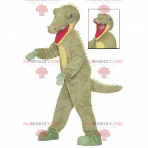 Groene krokodil dinosaurus mascotte met grote tanden -