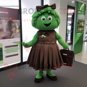 Forest Green Chocolate Bar mascot costume character dressed with a Pleated Skirt and Messenger bags