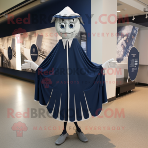 Navy Stilt Walker mascot costume character dressed with a Romper and Shawl pins