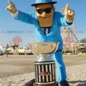 Mascotte d'homme habillé d'un costume bleu avec des lunettes -