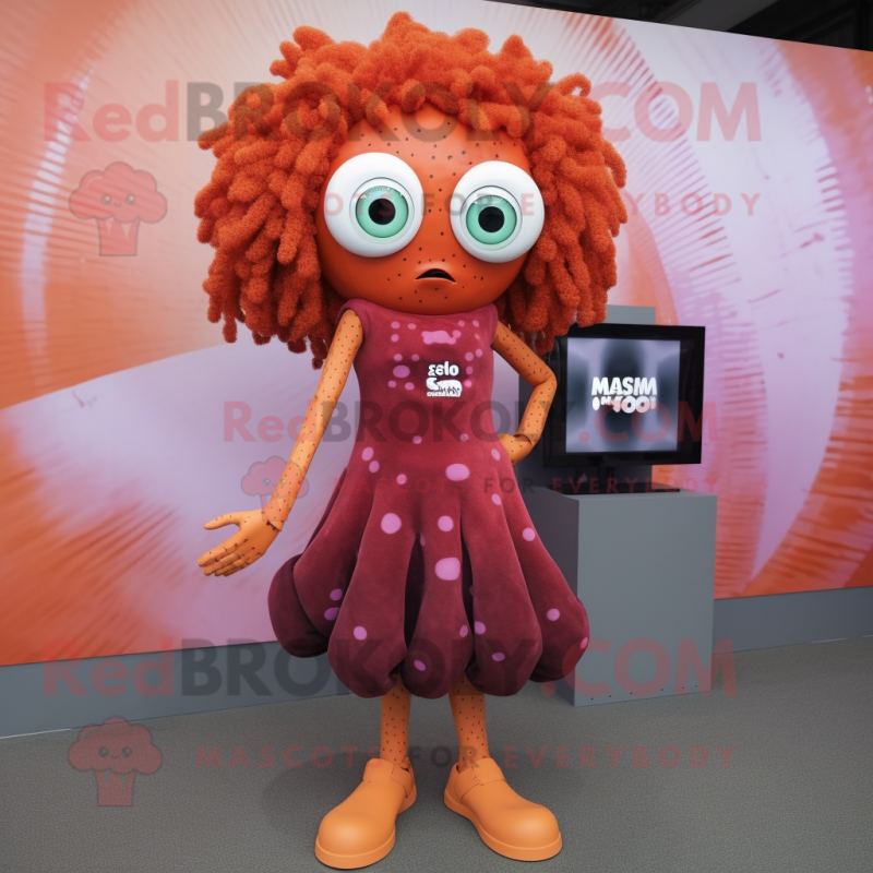 Rust Medusa mascot costume character dressed with a Mini Skirt and Digital watches Rust Medusa mascot costume character dressed with a Mini Skirt and Digital watches
