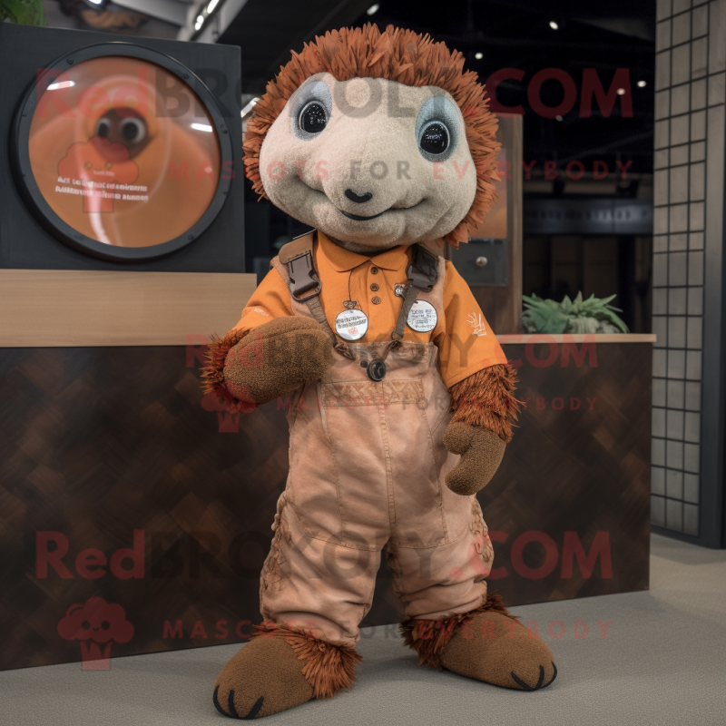 Rust Pangolin mascot costume character dressed with a Dungarees and Keychains