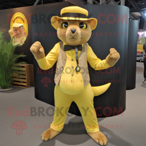 Lemon Yellow Jaguarundi mascot costume character dressed with a Suit Pants and Berets