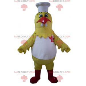 Mascote gigante de galinha amarela vestido como chef -